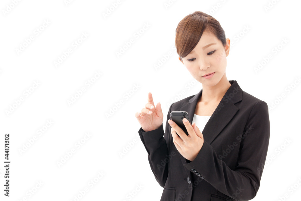 a young businesswoman using smart phone a young businesswoman using smart phone