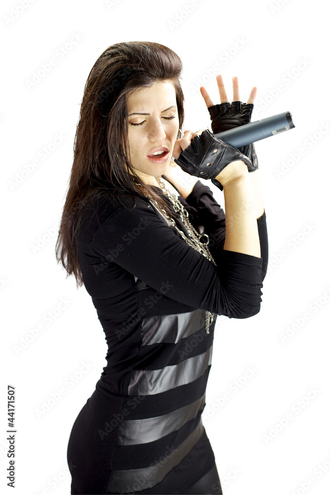 Portrait of female rock singer with microphone Portrait of female rock singer with microphone