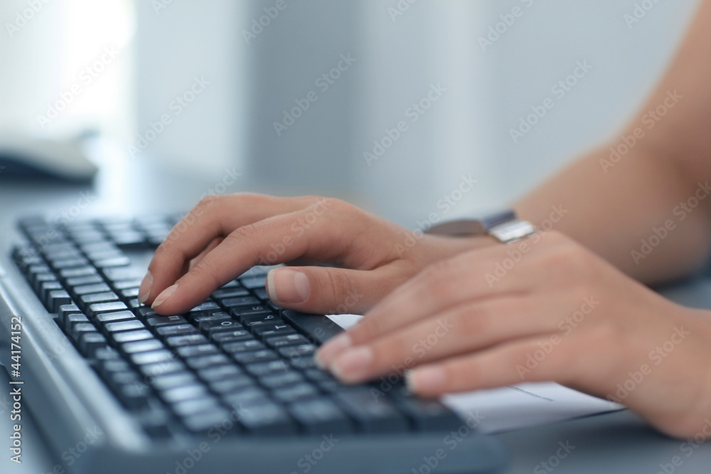 Close-up of typing female hands Close-up of typing female hands