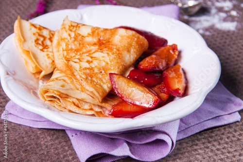 crepes with caramelised plums #44175518