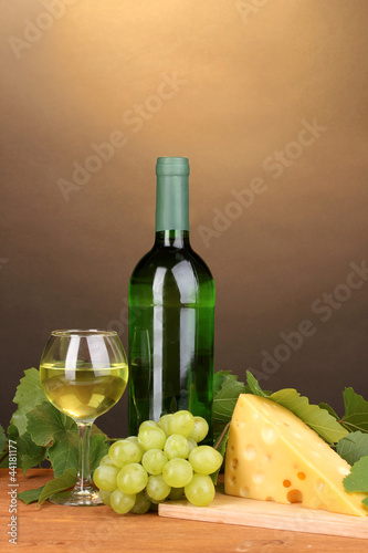 Bottle of great wine with glass and cheese