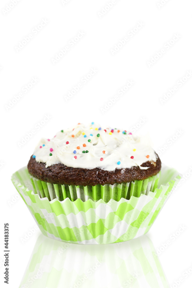One cupcake with frosting over white