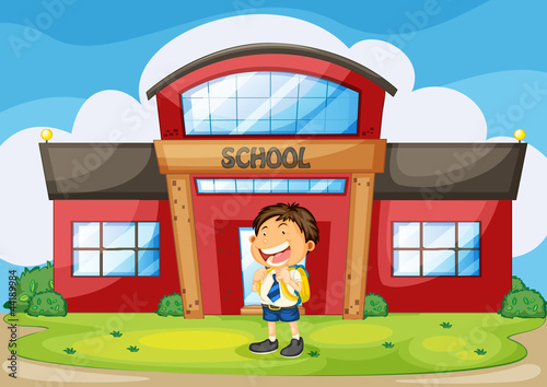 boy infront of school