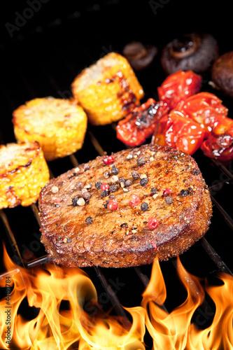 Delicious beef steak on grill