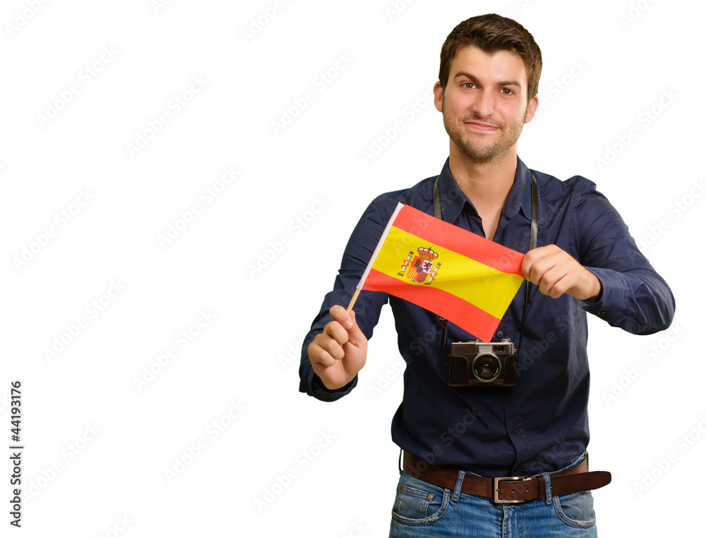 Portrait of a young man holding a flag Portrait of a young man holding a flag