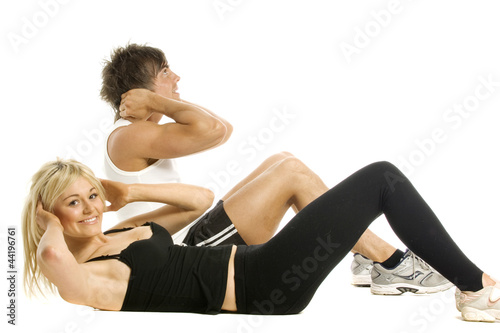 Man and woman working out isolated on a white background