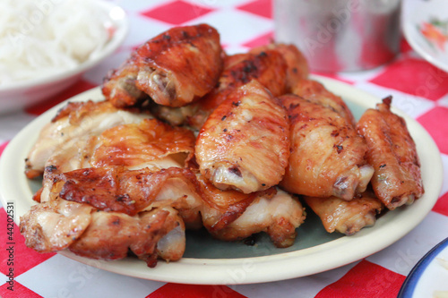 Grilled chicken are cooked in the restaurant
