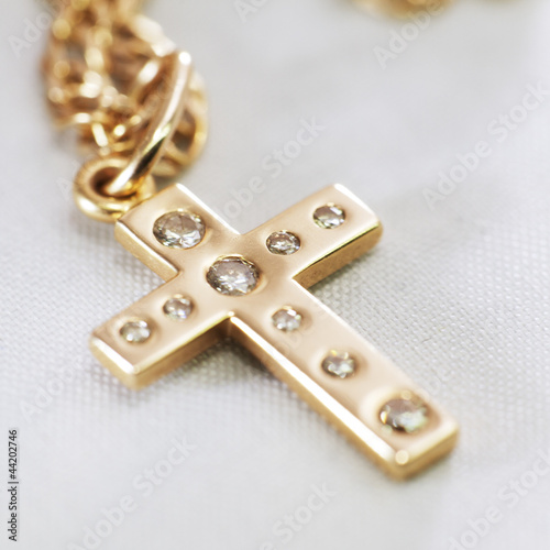 Gold cross with diamonds