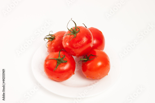 Tomatoes isolated on white © romantsubin