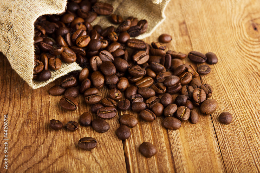 Coffee beans and burlap fabric Coffee beans and burlap fabric