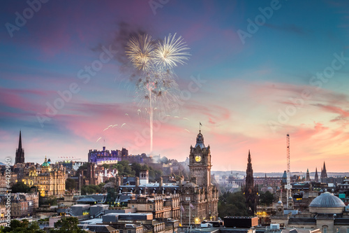 Fireworks over Edinburgh Castle at sunset