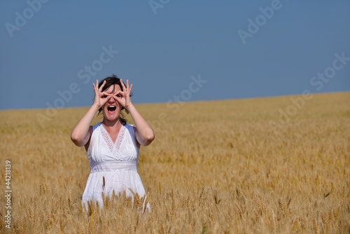 young woman in wheat field at summer © .shock