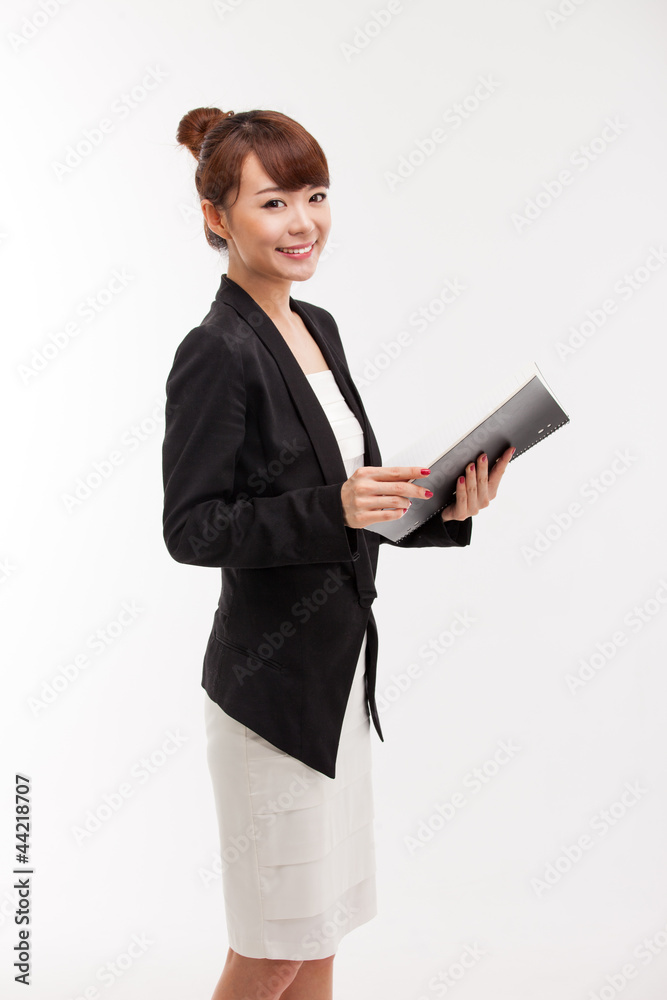Business woman and note book isolated on white background. Business woman and note book isolated on white background.