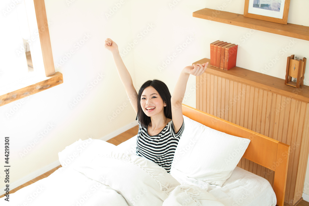 Beautiful young woman relaxing in the room Beautiful young woman relaxing in the room
