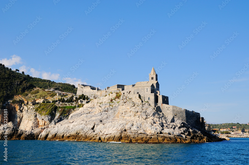 Entry in Portovenere harbour and church san Pietro