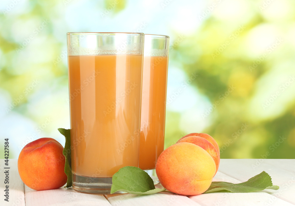 glasses of apricot juice and fresh apricots glasses of apricot juice and fresh apricots