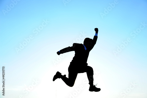 Wallpaper Mural Businessman running in the sun Torontodigital.ca