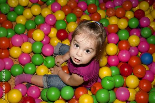 girl with colorful balls