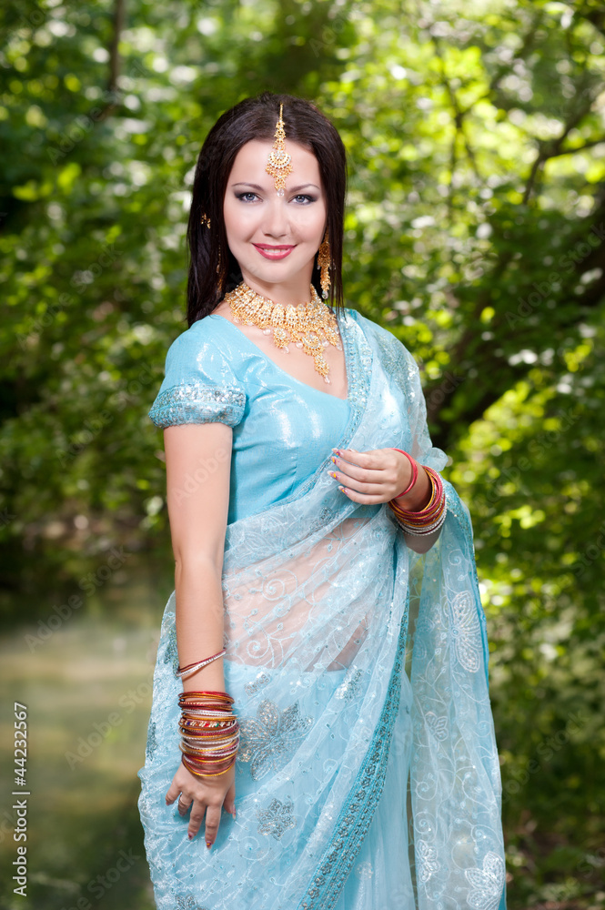 young beautiful brunette in the indian national dress young beautiful brunette in the indian national dress