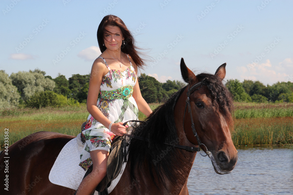 Obraz premium Girl with brown horse
