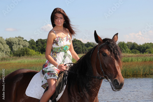 Girl with brown horse © Di Studio