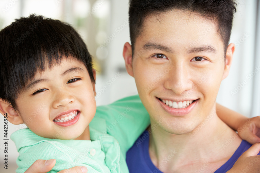 Head And Shoulders Portrait Of Chinese Father And Son Head And Shoulders Portrait Of Chinese Father And Son