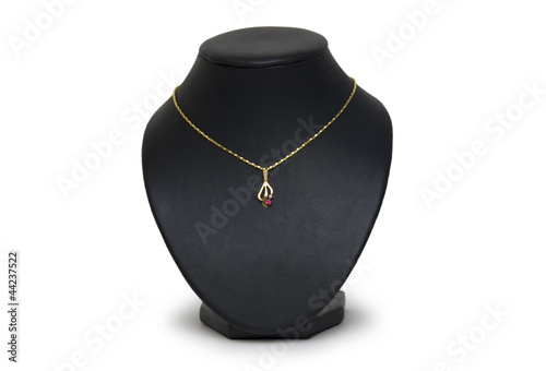 beautiful golden necklace on mannequin isolated on white