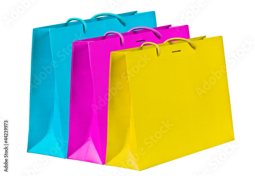 Cyan, magenta, yellow shopping bags.