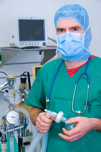 anesthesiologist with anesthetic machine