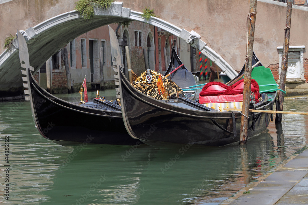 gondolas moored on canal, Venice, Italy, Europe