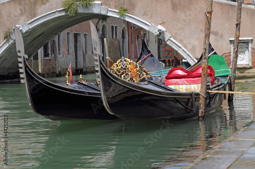 gondolas moored on canal, Venice, Italy, Europe