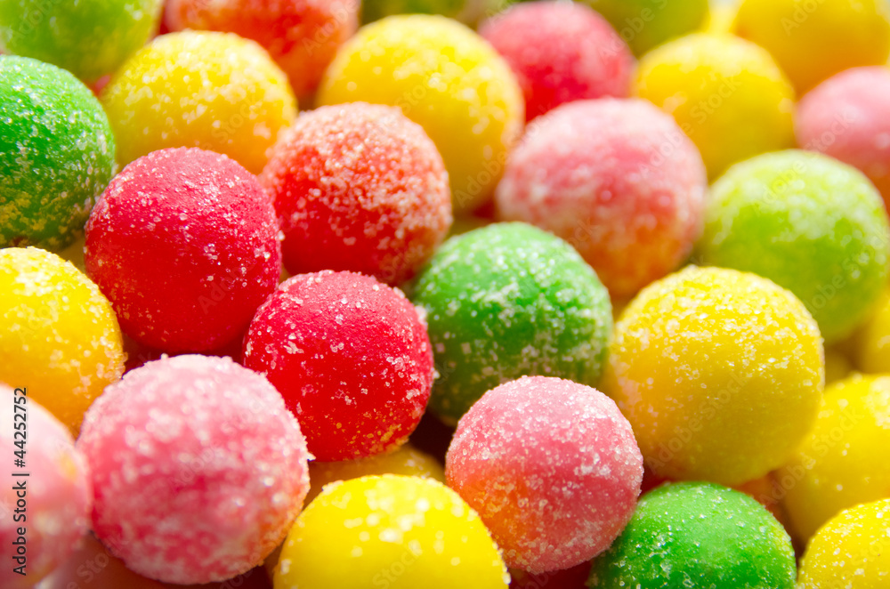 The background of multicolored dragee close-up