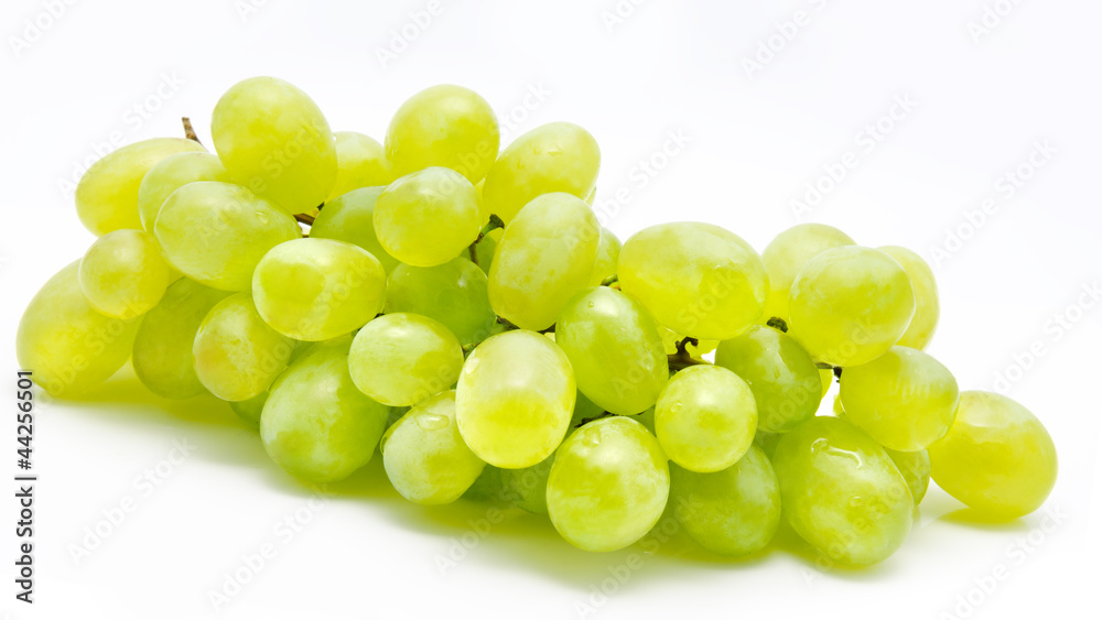 Branch of green grape isolated
