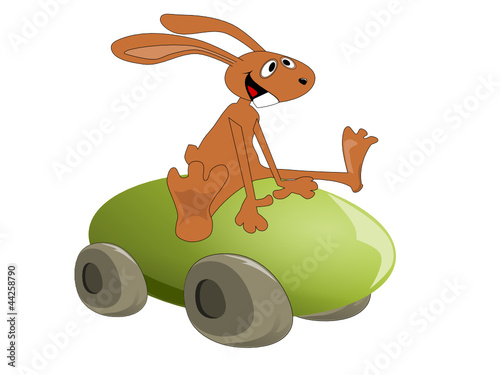 Funny bunny driving on an Easter egg