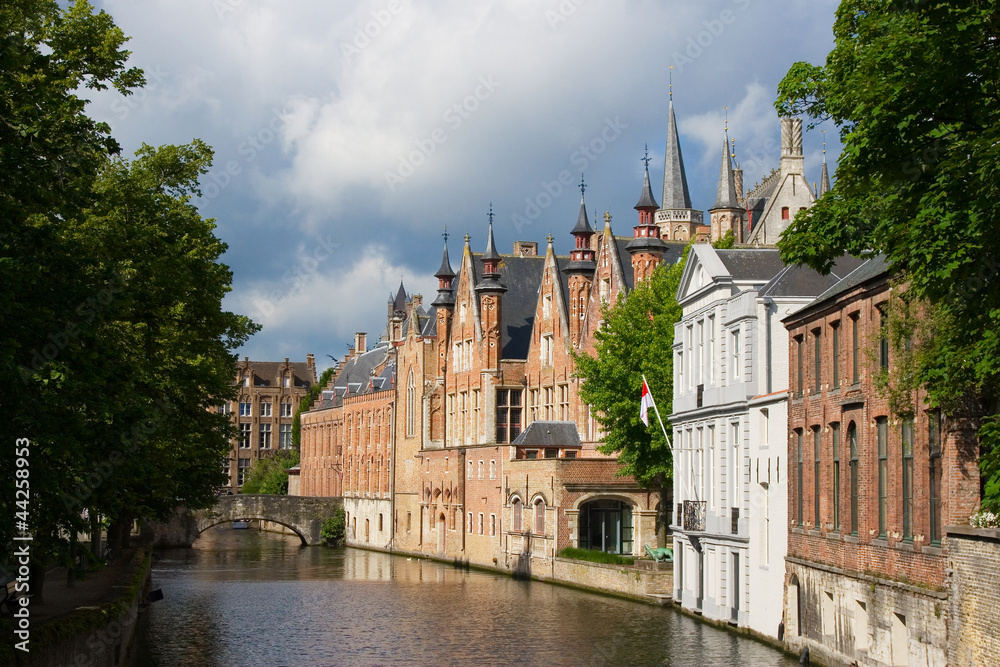 Medieval bridge over canal and flemish houses in Brugge, Belgium