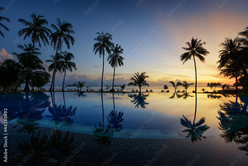 Beautiful sunrise at Beach with palms