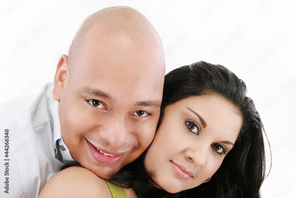 Portrait of a beautiful young happy smiling couple - isolated Portrait of a beautiful young happy smiling couple - isolated