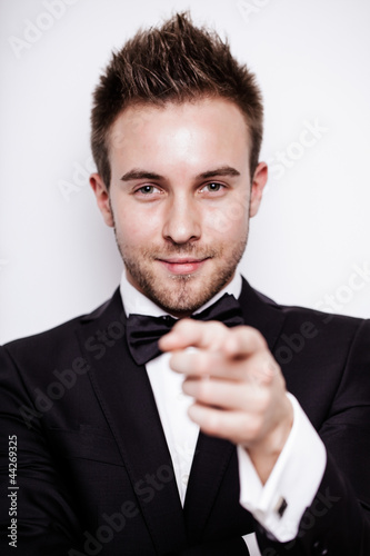 Portrait man in suit on grey backgroand