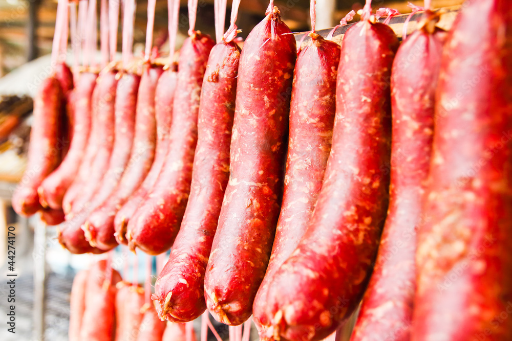 Home made meat salami sausage at street market hanging in line u Home made meat salami sausage at street market hanging in line u