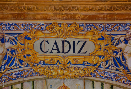 cadiz sign over a mosaic wall