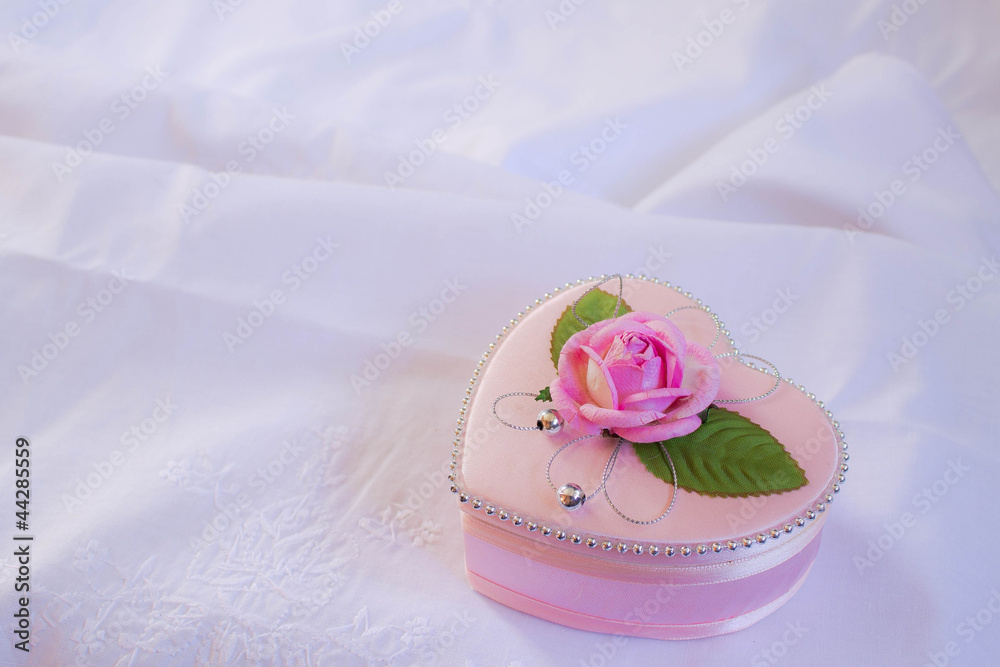 Wedding heart-shaped box with rose petals Wedding heart-shaped box with rose petals