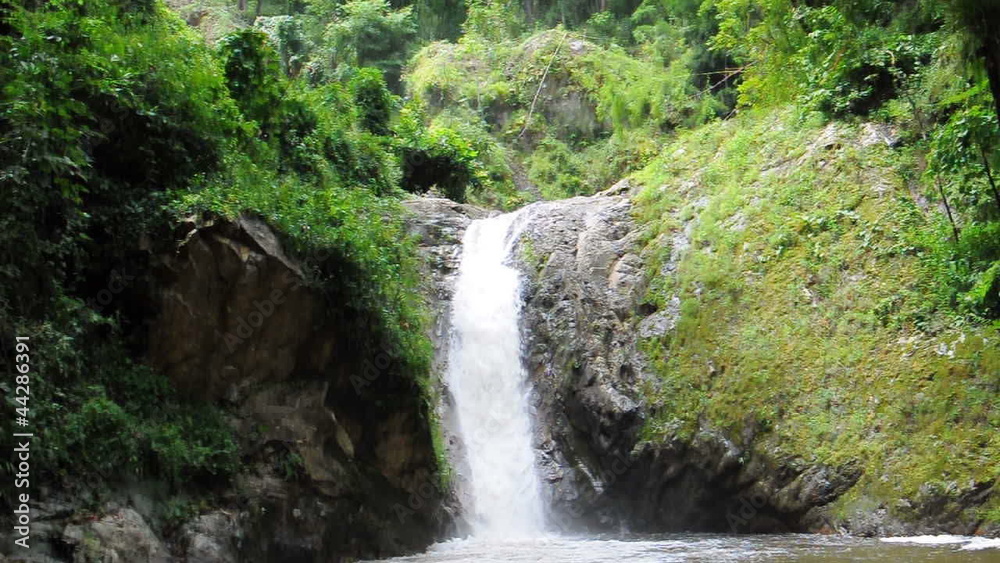 flowing waterfall in the jungle of Thailand flowing waterfall in the jungle of Thailand