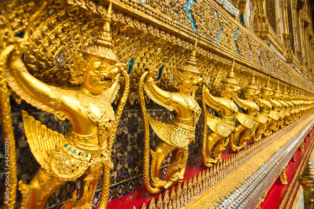 Golden garuda sculpture at Royal Palace in thai .