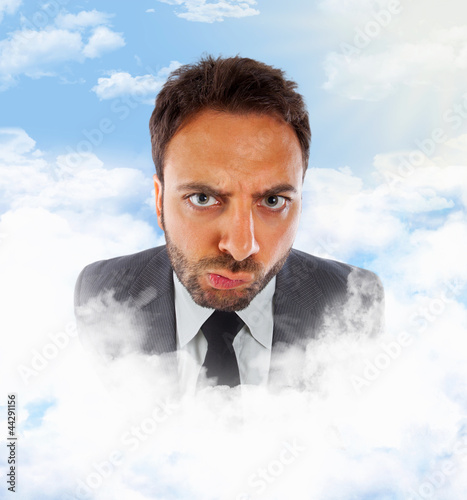 Businessman in the clouds