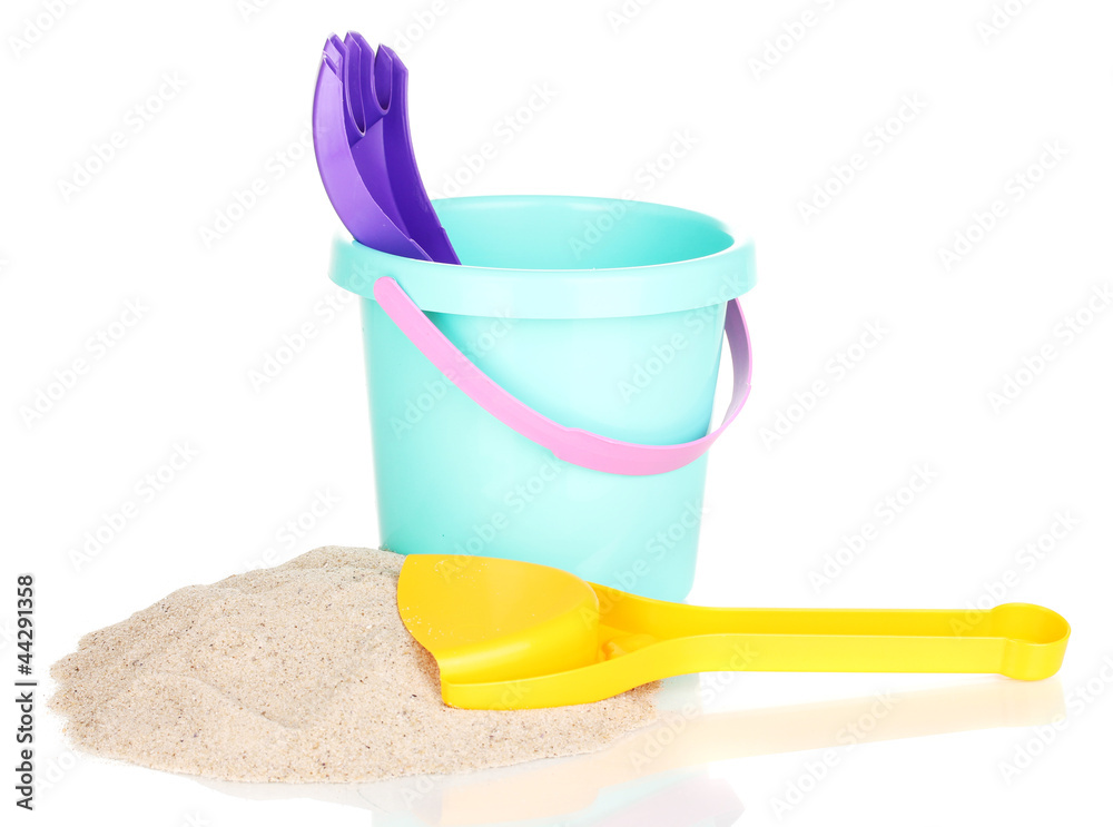 Children's beach toys and sand isolated on white Children's beach toys and sand isolated on white
