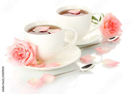 cups of tea with rose isolated on white