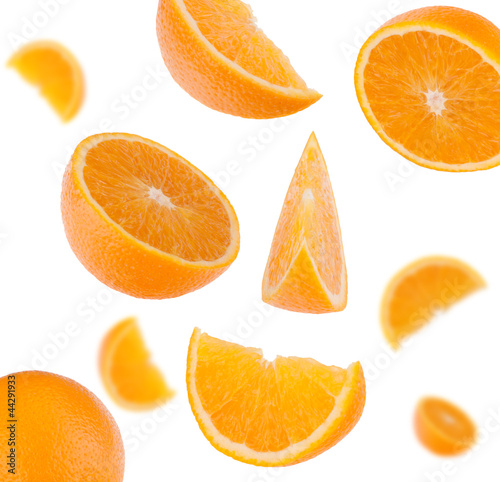 flying sliced orange fruit segments