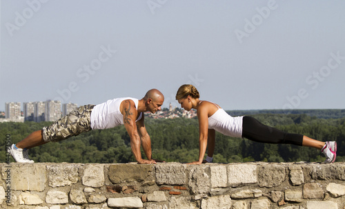 Pushups on a stone wall
