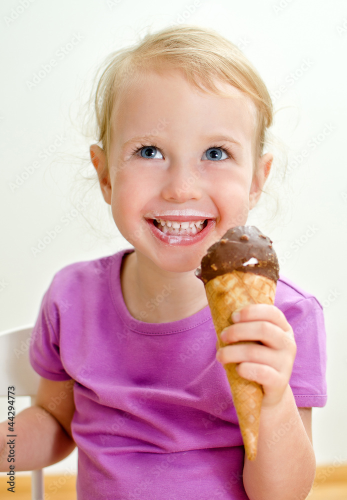 Cute little girl eating ice cream Cute little girl eating ice cream
