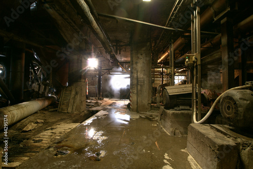 Old abandoned dirty empty scary factory interior